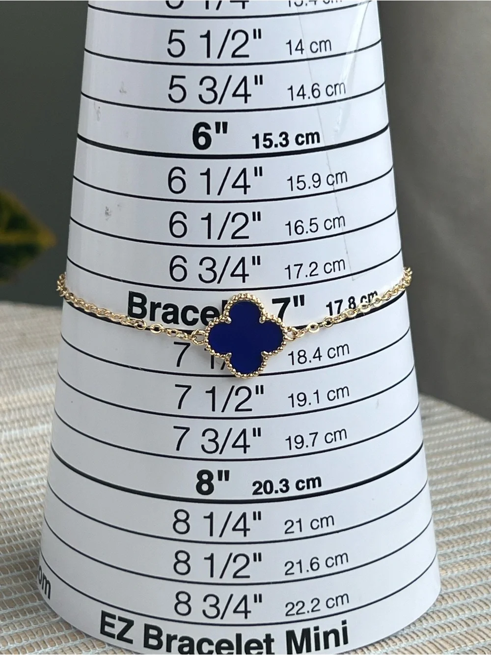 Gold Chain Bracelet with singular  Blue Clover Pendant